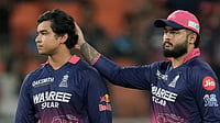 AP Photo : Rajasthan Royals' captain Riyan Parag consoles his teammate Vaibhav Sooryavanshi after Gujarat Titans won against Rajasthan Royals during the Indian Premier League cricket match in New Chandigarh.