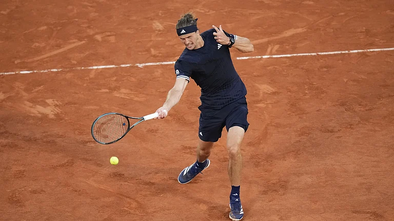 Alexander Zverev of Germany returns to Tomas Machac of the Czech Republic during their second round men's singles tennis match at the French Open tennis tournament in Paris, Wednesday, May 27, 2026. - (AP Photo/Christophe Ena)