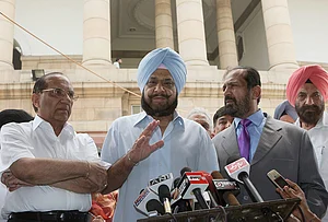| Photo: PTI/Vijay Kumar Joshi : In this file photo, IOA Secretary General Randhir Singh speaks to the media after a meeting with Prime Minister Manmohan Singh, in New Delhi. Former shooter and Olympian Randhir Singh passed away on Wednesday aged 79.