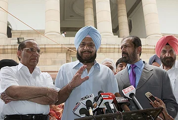 | Photo: PTI/Vijay Kumar Joshi : In this file photo, IOA Secretary General Randhir Singh speaks to the media after a meeting with Prime Minister Manmohan Singh, in New Delhi. Former shooter and Olympian Randhir Singh passed away on Wednesday aged 79.