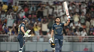 AP Photo : Gujarat Titans' captain Shubman Gill celebrates his century during the Indian Premier League cricket match between Gujarat Titans and Rajasthan Royals in New Chandigarh.