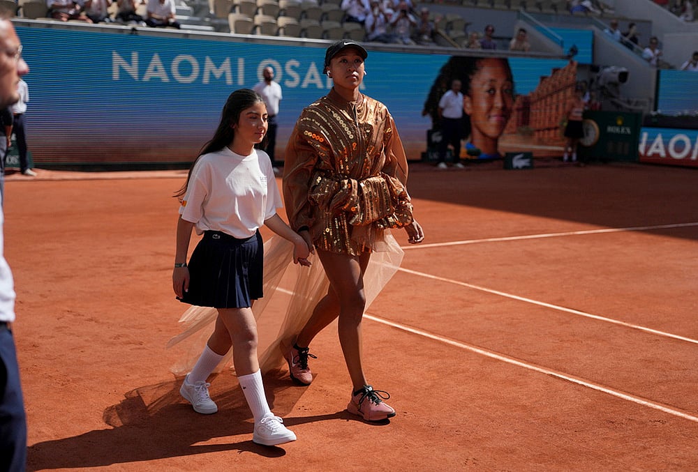 Naomi Osaka of Japan enters the court for the third round women's singles tennis match against Iva Jovic of the U.S. at the French Open tennis tournament in Paris. - | Photo: AP/Thibault Camus