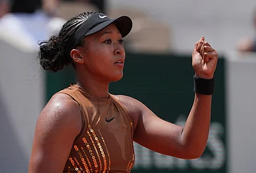 | Photo: AP/Thibault Camus : Naomi Osaka of Japan celebrates winning the third round women's singles tennis match against against Iva Jovic of the U.S. at the French Open tennis tournament in Paris.