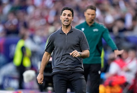 Arsenal's manager Mikel Arteta reacts during the Champions League final soccer match between Paris Saint-Germain and Arsenal in Budapest, Hungary.