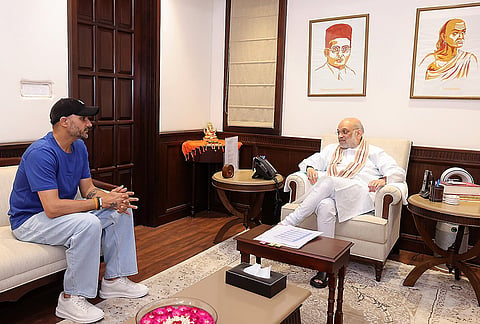 Union Home Minister Amit Shah during a meeting with former cricketer Harbhajan Singh, in New Delhi. 