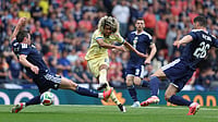 AP : Tahiti Chong, center, shoots and scores the opening goal during an international friendly soccer match between Scotland and Curacao in Glasgow