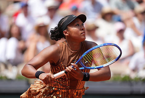 Naomi Osaka of Japan returns to Iva Jovic of the U.S. during their third round women's singles tennis match at the French Open tennis tournament in Paris.
