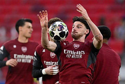 Arsenal's Declan Rice warms up during a training session ahead of the Champions League final soccer match between Paris Saint-Germain and Arsenal in Budapest, Hungary.
