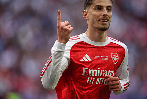 Arsenal's Kai Havertz celebrates after scoring during the Champions League final soccer match between Paris Saint-Germain and Arsenal in Budapest, Hungary.