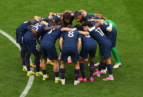 Paris Saint-Germain team huddles just prior to kick off of the Champions League final soccer match between Paris Saint-Germain and Arsenal in Budapest, Hungary.