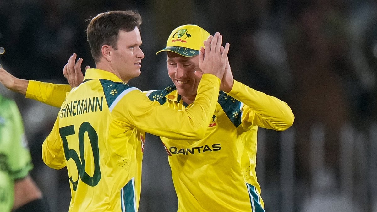 Australia's Matthew Kuhnemann, left, celebrates with Marnus Labuschagne after taking the wicket of Pakistan's Maaz Sadaqat during the first one day international cricket match between Pakistan and Australia, in Rawalpindi, Pakistan. - AP Photo