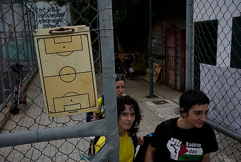 Greek athletes of Fostiras Kaisarianis arrive before a semifinal match against Cameroon during the Kypseli Mundial in Athens, Greece.
