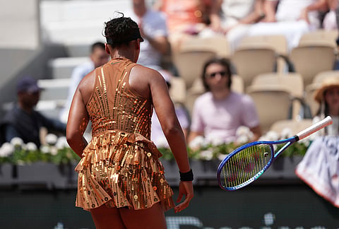 Naomi Osaka of Japan reacts as she plays against Iva Jovic of the U.S. during their third round women's singles tennis match at the French Open tennis tournament in Paris.