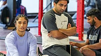 Vinesh Phogat's 'Zid' To Wrestle And Fight The System Lives On Despite Asian Games 2026 Trials Defeat | Photo: PTI/Kamal Kishore : Wrestler Vinesh Phogat trains after the Wrestling Federation of India (WFI) allowed her to compete in the women’s 53kg category for the Asian Games selection trials, reversing its earlier decision that had restricted her participation to the 50kg division, at Indira Gandhi Arena, in New Delhi.