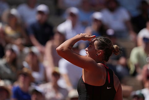 Aryna Sabalenka of Belarus reacts as she plays against Daria Kasatkina of Australia during their third round women's singles tennis match at the French Open tennis tournament in Paris.