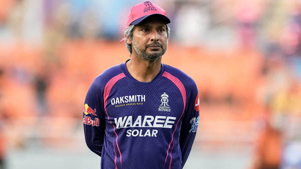 Rajasthan Royals' head coach Kumar Sangakkara looks on as his team warms up before the start of the Indian Premier League cricket match between Rajasthan Royals and Sunrisers Hyderabad in New Chandigarh, India, Wednesday, May 27, 2026 - (AP Photo/Ashwini Bhatia