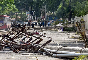 | Photo: PTI : Chikkamagaluru: Electric poles damaged due to strong winds and rainfall are seen, in Chikkamagaluru, Karnataka.