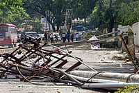 | Photo: PTI  : Chikkamagaluru: Electric poles damaged due to strong winds and rainfall are seen, in Chikkamagaluru, Karnataka. 