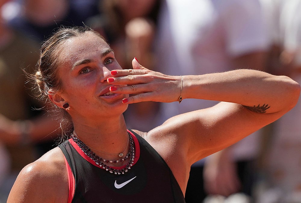 Aryna Sabalenka of Belarus celebrates winning the third round women's singles tennis match against Daria Kasatkina of Australia at the French Open tennis tournament in Paris. - | Photo: AP/Thibault Camus
