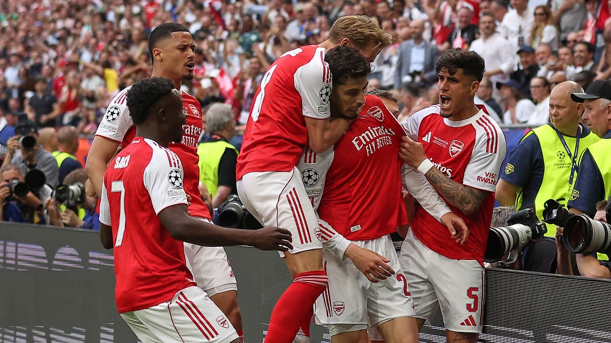Arsenal players celebrate after scoring during the Champions League final soccer match between Paris Saint-Germain and Arsenal in Budapest, Hungary, Saturday, May 30, 2026.  - AP