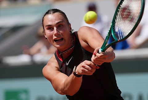 Aryna Sabalenka of Belarus returns to Daria Kasatkina of Australia during their third round women's singles tennis match at the French Open tennis tournament in Paris.
