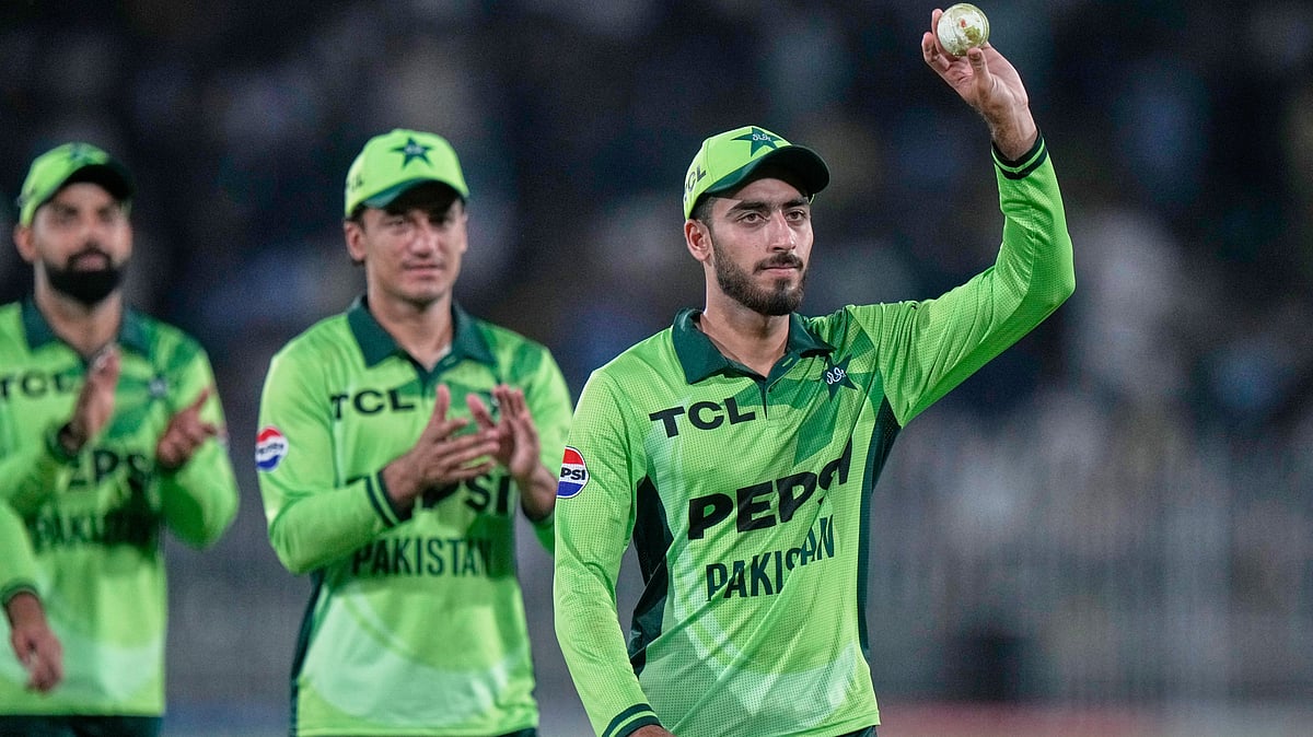 Pakistan’s Arafat Minhas, right, who took five wickets, displays the ball as he walks off the field on the end of first innings during the first one day international cricket match between Pakistan and Australia, in Rawalpindi, Pakistan, Saturday, May 30, 2026. - | Photo: AP/Anjum Naveed