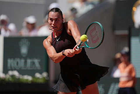 Aryna Sabalenka of Belarus returns to Daria Kasatkina of Australia during their third round women's singles tennis match at the French Open tennis tournament in Paris.