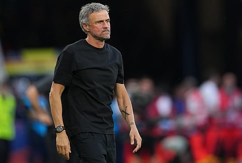 PSG's head coach Luis Enrique watches his team during the Champions League final soccer match between Paris Saint-Germain and Arsenal in Budapest, Hungary.
