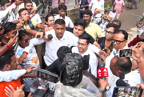 TMC General Secretary Abhishek Banerjee after stones, shoes and eggs were hurled at him during his visit to the families of post-poll violence victims, in Sonarpur, West Bengal.