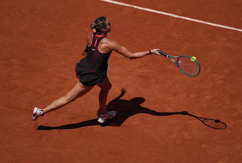 Aryna Sabalenka of Belarus returns to Daria Kasatkina of Australia during their third round women's singles tennis match at the French Open tennis tournament in Paris.
