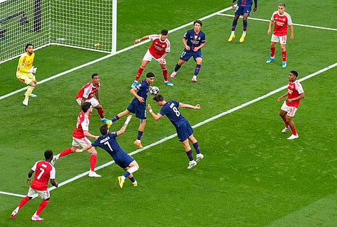 PSG's Fabian Ruiz heads the ball over the bar during the Champions League final soccer match between Paris Saint-Germain and Arsenal in Budapest, Hungary.