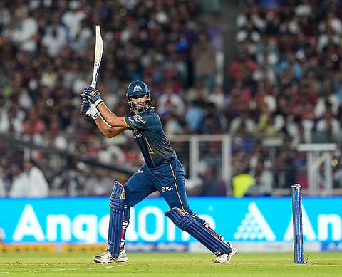 Gujarat Titans' Washington Sundar plays a shot during the Indian Premier League (IPL) 2026 Final T20 cricket match between Royal Challengers Bengaluru and Gujarat Titans, in Ahmedabad, Gujarat.