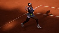 (AP Photo/Christophe Ena) : Coco Gauff of the U.S. returns to Anastasia Potapova of Austria during their third round women's singles tennis match at the French Open tennis tournament in Paris, Saturday, May 30, 2026.