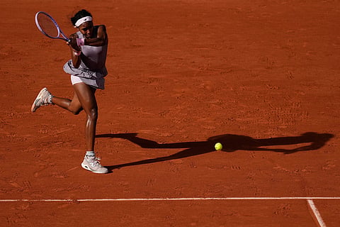 Coco Gauff of the U.S. returns to Anastasia Potapova of Austria during their third round women's singles tennis match at the French Open tennis tournament in Paris.