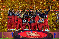RCB Vs GT, IPL 2026 Final: Virat Kohli Fifty Drives Royal Challengers Bengaluru To Successive Title In Ahmedabad AP Photo/Ajit Solanki : Royal Challengers Bengaluru players celebrate with the trophy after beating Gujarat Titans in the Indian Premier League 2026 final in Ahmedabad, India, Monday, June 1, 2026.