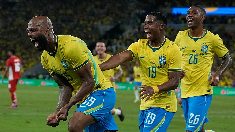 Brazil's Igor Thiago, left, celebrates after scoring his side's fifth goal from the penalty spot during a friendly soccer match against Panama in Rio de Janeiro. - AP Photo
