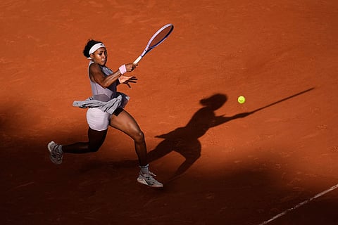 Coco Gauff of the U.S. returns to Anastasia Potapova of Austria during their third round women's singles tennis match at the French Open tennis tournament in Paris.