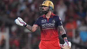 | Photo: AP/Ajit Solanki : Royal Challengers Bengaluru’s Virat Kohli talks to umpire after he was given out which was later reversed by third umpire during the Indian Premier League final cricket match between Gujarat Titans and Royal Challengers Bengaluru in Ahmedabad, India, Sunday, May 31, 2026.