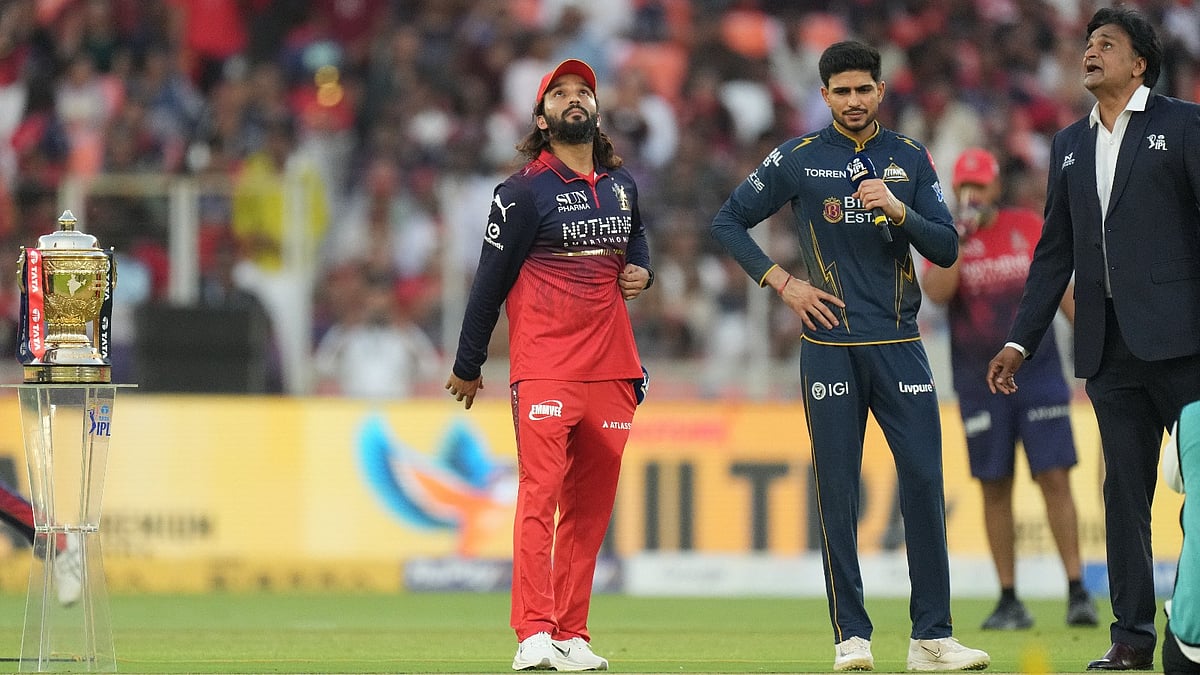 PTI : Royal Challengers Bengaluru's captain Rajat Patidar, center left, tosses the coin for the toss as Gujarat Titans' captain Shubman Gill watches during the Indian Premier League final cricket match between Gujarat Titans and Royal Challengers Bengaluru in Ahmedabad, India, Sunday, May 31, 2026