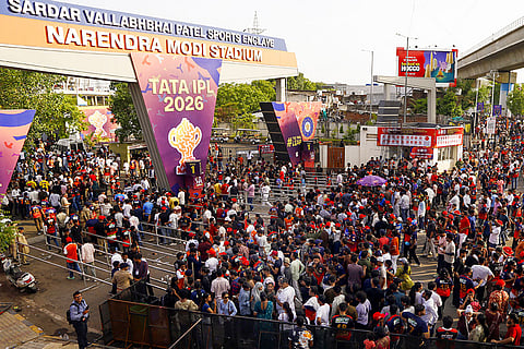 Spectators arrive at Narendra Modi Stadium before the Indian Premier League (IPL) 2026 Final T20 cricket match between Royal Challengers Bengaluru and Gujarat Titans, in Ahmedabad, Gujarat.