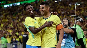 AP Photo : Brazil's Casemiro, right, celebrates with teammate Vinicius Junior after scoring his side's second goal against Panama during a friendly soccer match in Rio de Janeiro.