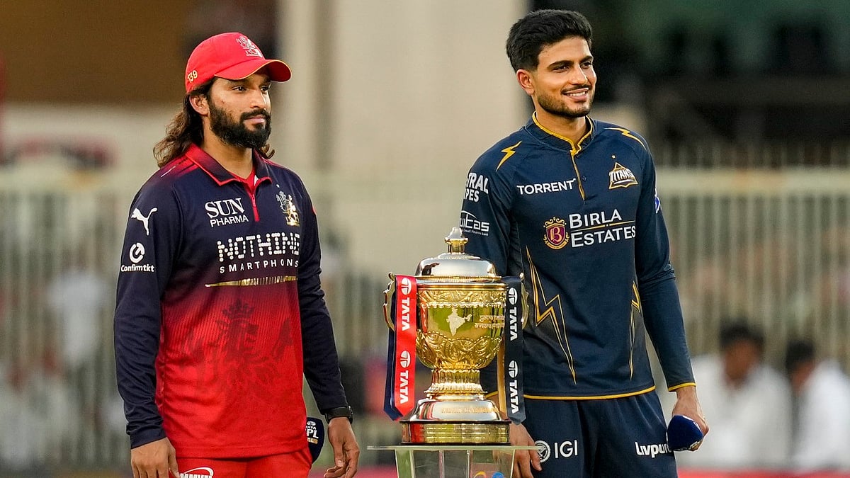 Ahmedabad: Royal Challengers Bengaluru's captain Rajat Patidar, left, and Gujarat Titans' captain Shubman Gill pose for photographs with the IPL trophy before the Indian Premier League (IPL) 2026 Final T20 cricket match between Royal Challengers Bengaluru and Gujarat Titans, in Ahmedabad, Gujarat, Sunday, May 31, 2026. - PTI