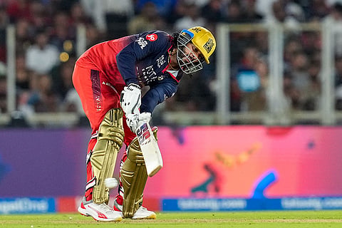 Royal Challengers Bengaluru's Venkatesh Iyer plays a shot during the Indian Premier League (IPL) 2026 Final T20 cricket match between Royal Challengers Bengaluru and Gujarat Titans, in Ahmedabad, Gujarat.