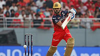 (AP Photo/Surjeet Yadav)
 : Royal Challengers Bengaluru's Virat Kohli plays a shot during the Indian Premier League cricket match between Punjab Kings and Royal Challengers Bengaluru at Maharaja Yadavindra Singh Cricket Stadium in Mohali, India, Sunday, April 20, 2025. 

