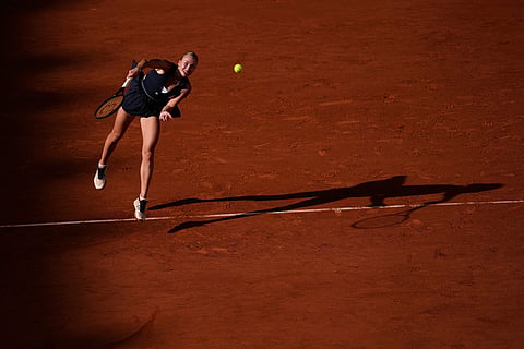 Anastasia Potapova of Austria serves to Coco Gauff of the U.S. during their third round women's singles tennis match at the French Open tennis tournament in Paris.