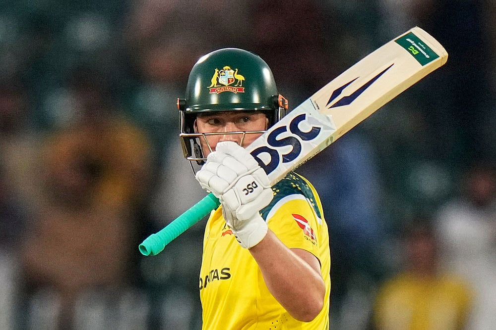Australias Matt Renshaw celebrates after scoring fifty runs