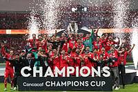 | Photo: AP/Fernando Llano : Toluca's Marcel Ruiz lifts the trophy after beating Tigres during the CONCACAF Champions Cup final soccer match in Toluca, Mexico, Saturday, May 30, 2026. ()