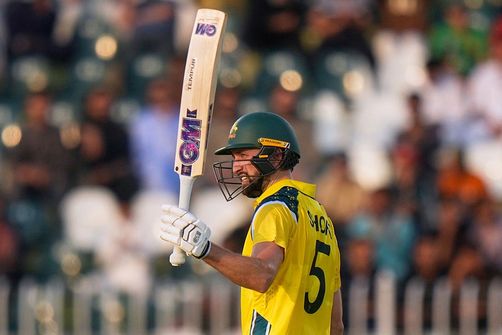 Australias Matthew Short celebrates after scoring fifty runs