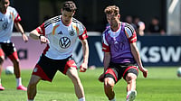 | Photo: Federico Gambarini/dpa via AP : Germany’s Florian Wirtz, left, and Joshua Kimmich attend a training session in Herzogenaurach, Germany, Thursday May 28, 2026, ahead of the World Cup tournament. 