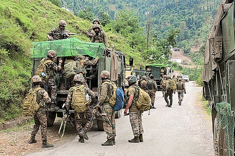Security personnel during an anti-terror operation in the Dori Mal forest area near Gambhi Mughlan, in Rajouri district, Jammu and Kashmir.